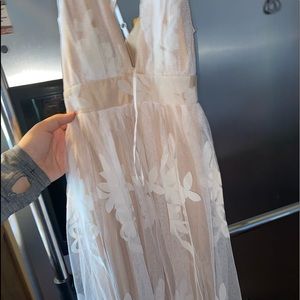 This beautiful long white and tan dress is brand new !
